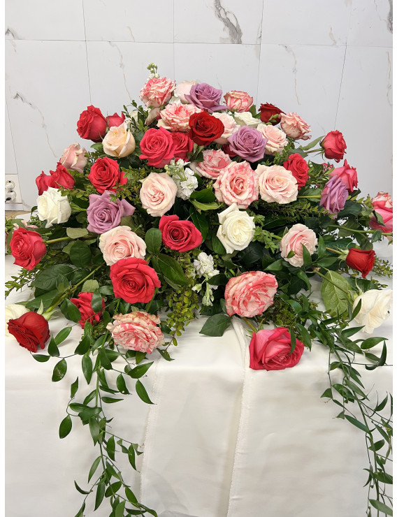 CASKET SPRAY WITH MIXED SHADES OF PINK ROSES